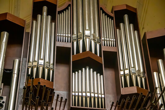 Massive Church organ instrument made of steel and timber in old traditional style, in main modern Chatolic Church In Abuja, capitol of Nigeria, Called National Ecumenical Centre