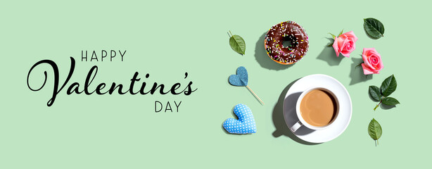 Valentines Day message with a cup of coffee and a donut - flat lay