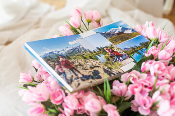 photo books and flowers, photo album - obrazy, fototapety, plakaty