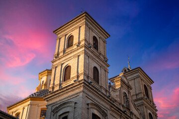 Rear facade of the monumental baroque church of Santo Domingo de Murcia in the square of the same name at sunset