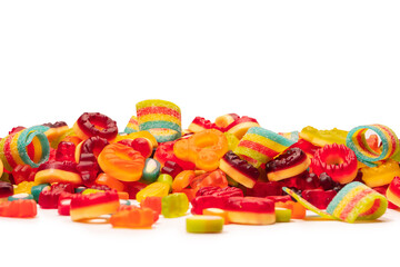 Assorted colorful gummy candies. Top view. Jelly donuts. Jelly bears. Isolated on a white background.