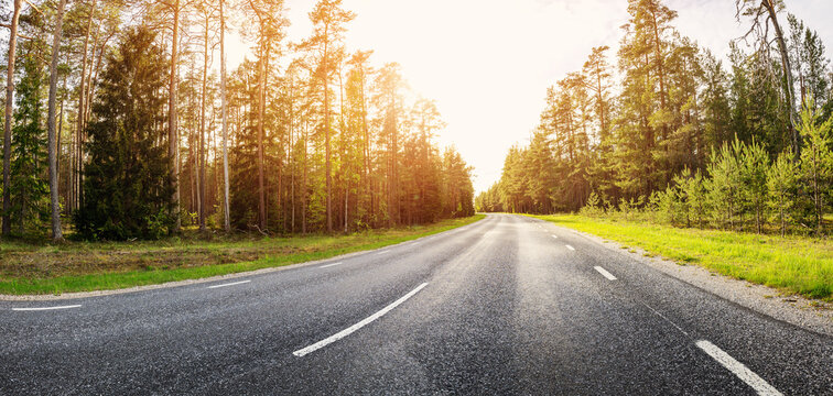 Beautiful background of the asphalt road in spring.