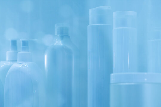 plastic white jars with various cosmetics to create a beautiful sleek appearance