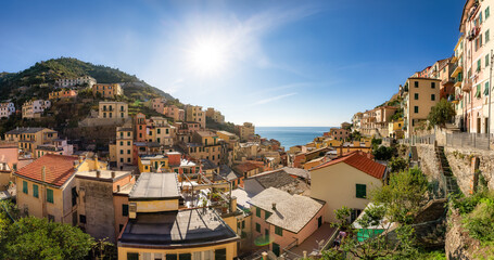 Colorful apartment homes in touristic town, Riomaggiore, Italy. Cinque Terre National Park. Panorama