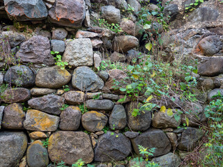 Ancient architecture. Remains of an old castle. Fortification building. Sights of Georgia. Temple...