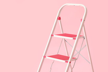 Maintenance ladder on pink background