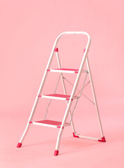 Maintenance ladder on pink background