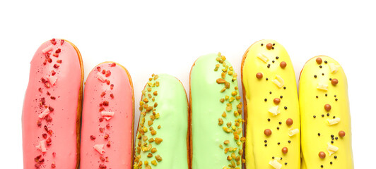 Various glazed eclairs isolated on white background