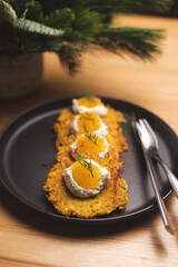 Potato meal with cream cheese and pike caviar. Food photography. Restaurant serving food. Delicacy.