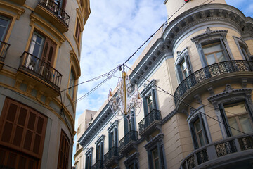 Fototapeta premium christmas decorations placed in calle larios in the historic center of malaga