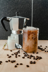 Iced Coffee on wood backdrop 