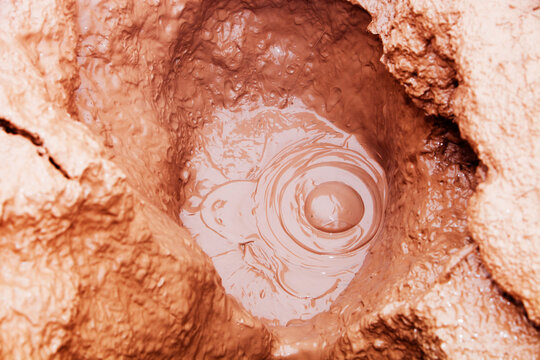 Bubbling mud pools in Hvergagerdi geothermal spot, Iceland