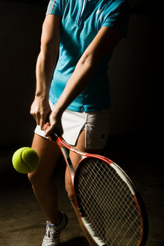 A tennis player poses for action portraits in Carlsbad, CA.