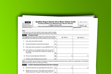 Form 8936 documentation published IRS USA 01.14.2021. American tax document on colored - obrazy, fototapety, plakaty