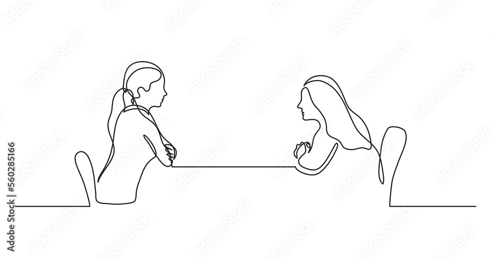 Wall mural two young women sitting behind table talking - png image with transparent background