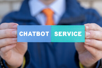 Businessman holding colorful styrofoam blocks with inscription: CHATBOT SERVICE. Artificial...