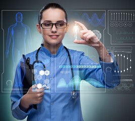 Doctor in futuristic medical concept pressing button