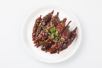 Food eaten by soaking red pepper in soy sauce, soybean paste, or red pepper paste.