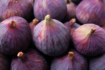 Fresh ripe figs as background, closeup view