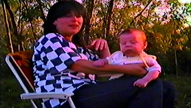 Mother with her baby in the late 1970s