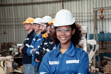 Portrait engineers team factory industry wearing safety uniform work diverse workers show happiness...
