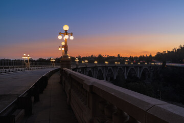 Fototapeta na wymiar Colorado Street Bridge in the City of Pasadena, Los Angeles County, shown at dusk before extensive fencing.