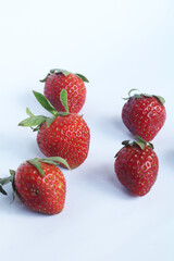 Strawberries on a white background.
