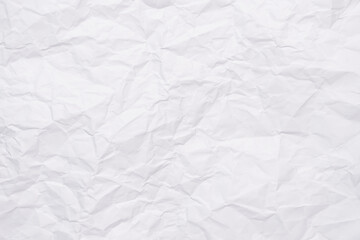 White crumpled paper texture background, clean white wrinkled paper, top view.