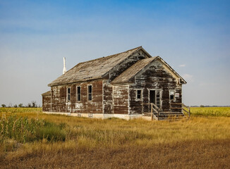 Old Abandoned Wooden Farm House on the Nebraska Prairie