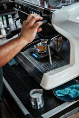 Barista making cappuccino, bartender preparing coffee drink