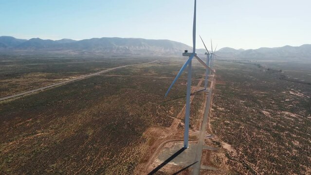 Aerial drone shot of wind solar energy renewables power plant wind turbine Port Augusta outback farm travel tourism climate change Adelaide South Australia 4K