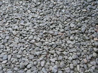 gray gravel on the parking lot texture.