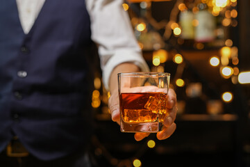 Bartender pouring Whiskey, on  bar,