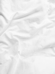 White fabric texture background, wavy fabric. Abstract white fabric texture background. Cloth soft wave. Creases of satin, silk, and cotton. The luxury of white fabric texture background.