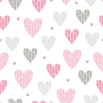 Seamless knitted hearts pattern. Love background.