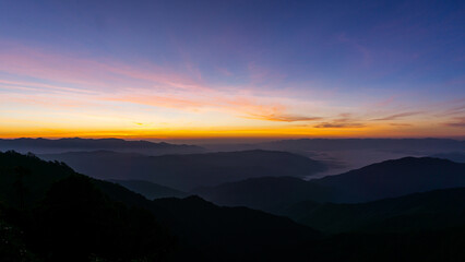 Night sky with moon before sunset on mountain at .Doi Phu Kha of Thailand for background.