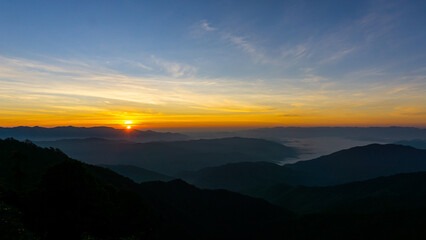 Night sky with moon before sunset on mountain at .Doi Phu Kha of Thailand for background.