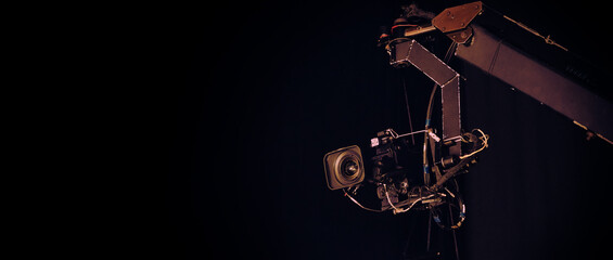 TV Camera broadcast on the crane tripod for shooting or recording and broadcasting content in...