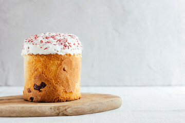 Easter cake garnished with sugar on a gray background