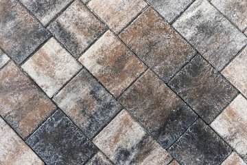 Paving slabs with frost, top view. Background texture