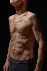Fototapeta premium Paris, France - 01 09 2023: still life. Studio shot of a mature man posing shirtless