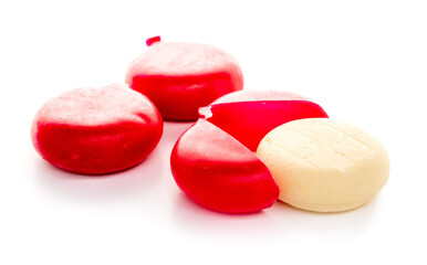 Piece of camembert cheese on white