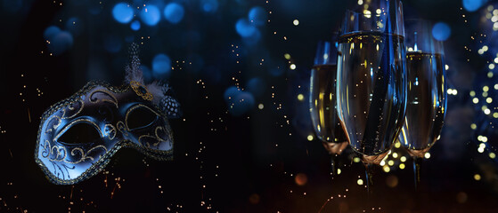 Venetian carnival mask with champagne in front of luminous night sky with festive bokeh.