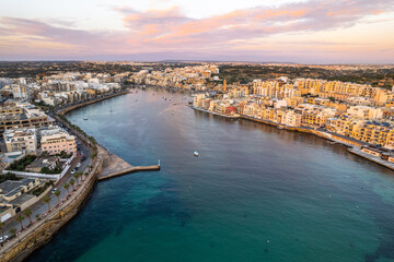 Fototapeta premium Marsaskala fisherman village in Malta, aerial drone view