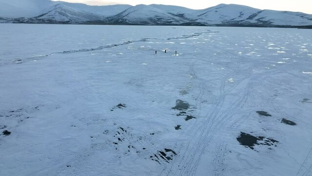 People in the Frozen Cildir Lake and Carriage Drone Video, Cildir Ardahan, Turkey