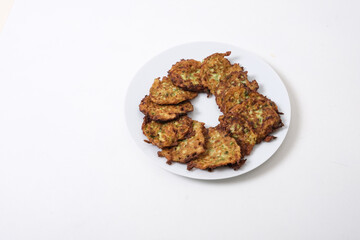 Traditional Turkish Zuccini Mucver isolated on white background