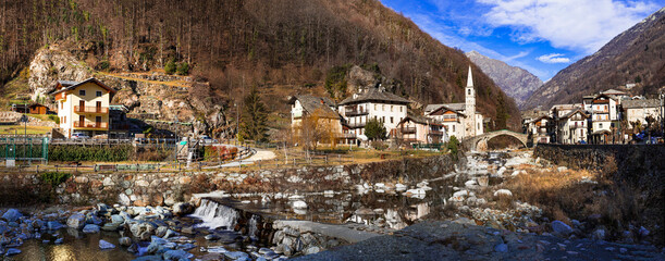 most scenic Alpine villages in Italian region Valle d'Aosta  - Fontainemore, medieval borgo surrounded by Alps mountains © Freesurf