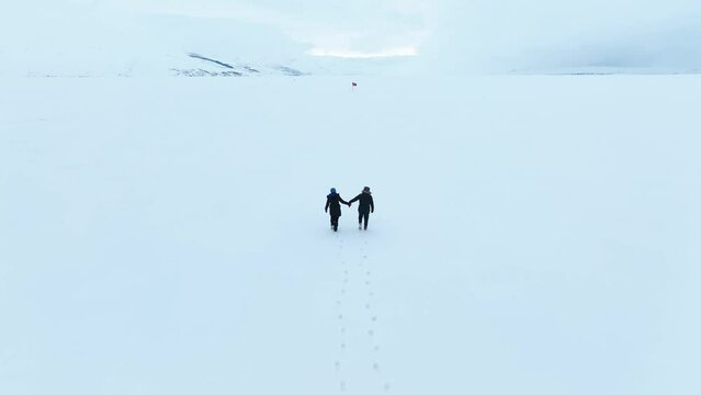 People in the Frozen Cildir Lake and Carriage Drone Video, Cildir Ardahan, Turkey