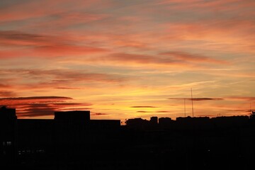 Picturesque view of bright dawn in city