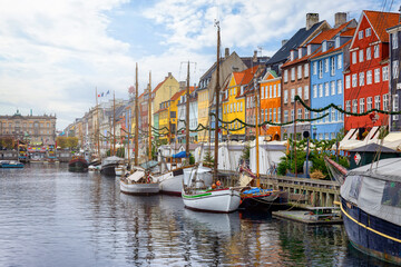 Beautiful winter view of the popular Nyhavn area at Copenhagen, Denmark, with the colourful houses along the canal